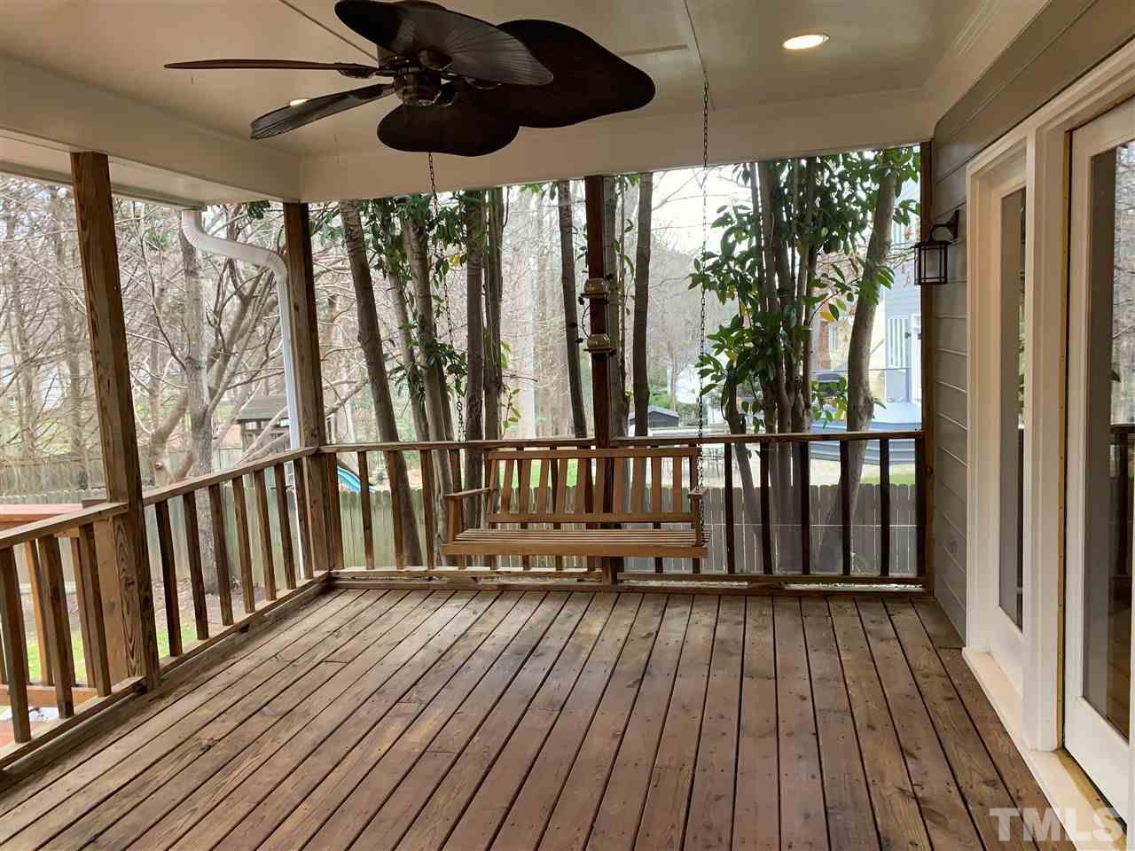 8800 Audley Circle Raleigh, NC 27615 - Photo 26 of 27 a balcony with wooden floor and outdoor space