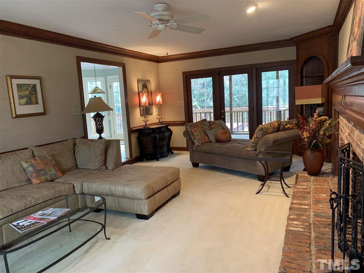 8800 Audley Circle Raleigh, NC 27615 - Photo 6 of 27 a living room with furniture and a large window