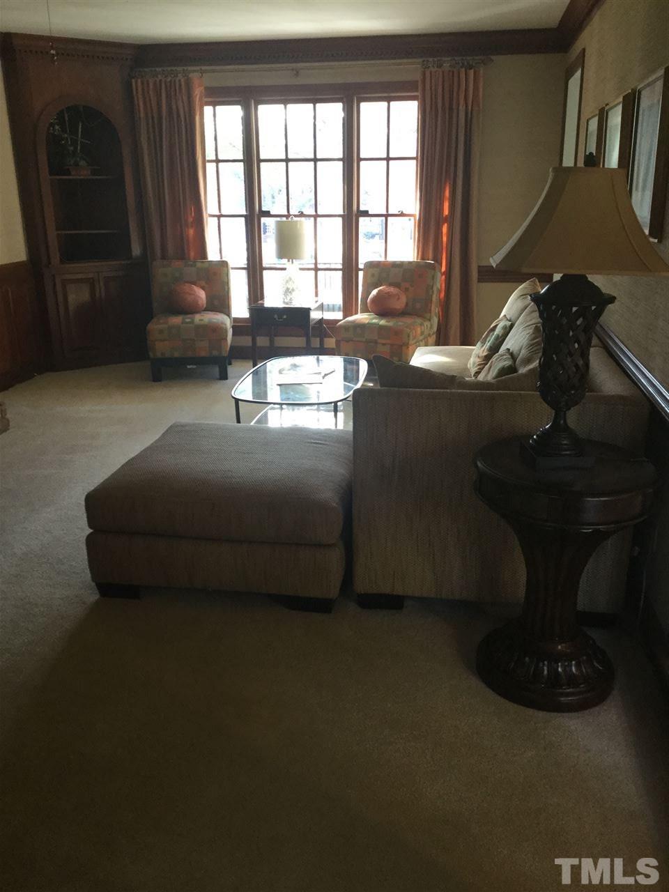 8800 Audley Circle Raleigh, NC 27615 - Photo 7 of 27 a living room with furniture and a floor to ceiling window