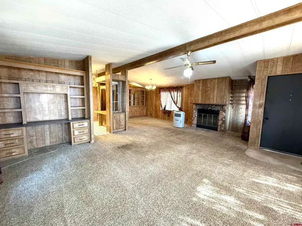 a view of a livingroom with a fireplace