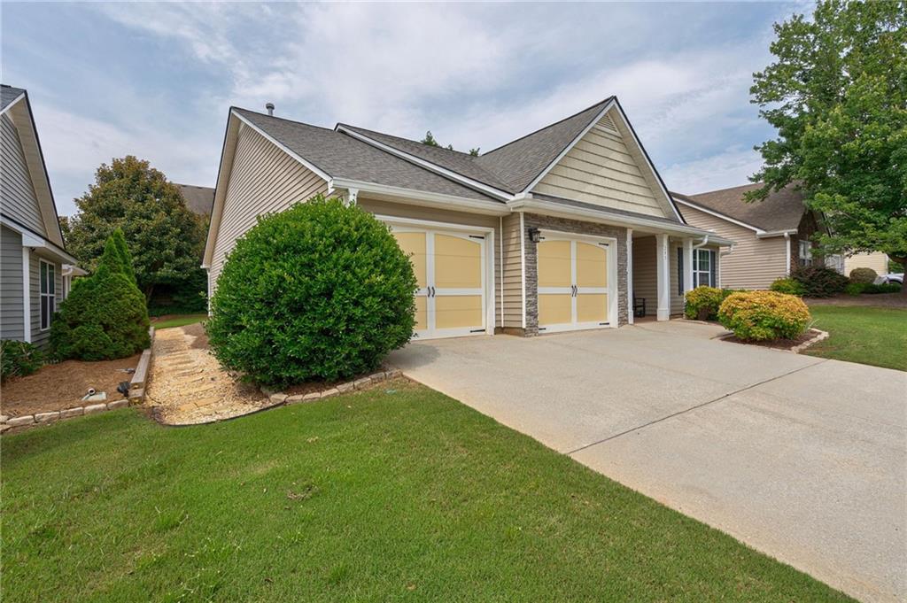 245 Memory Lane Winder, GA 30680 - Photo 3 of 62 a view of a house with a yard
