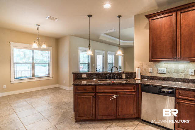 471 Dover Street Fairhope, AL 36532 - Photo 10 of 29 Hop up bar with pendant lighting and view of breakfast nook