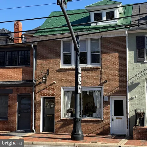 a front view of a building with street