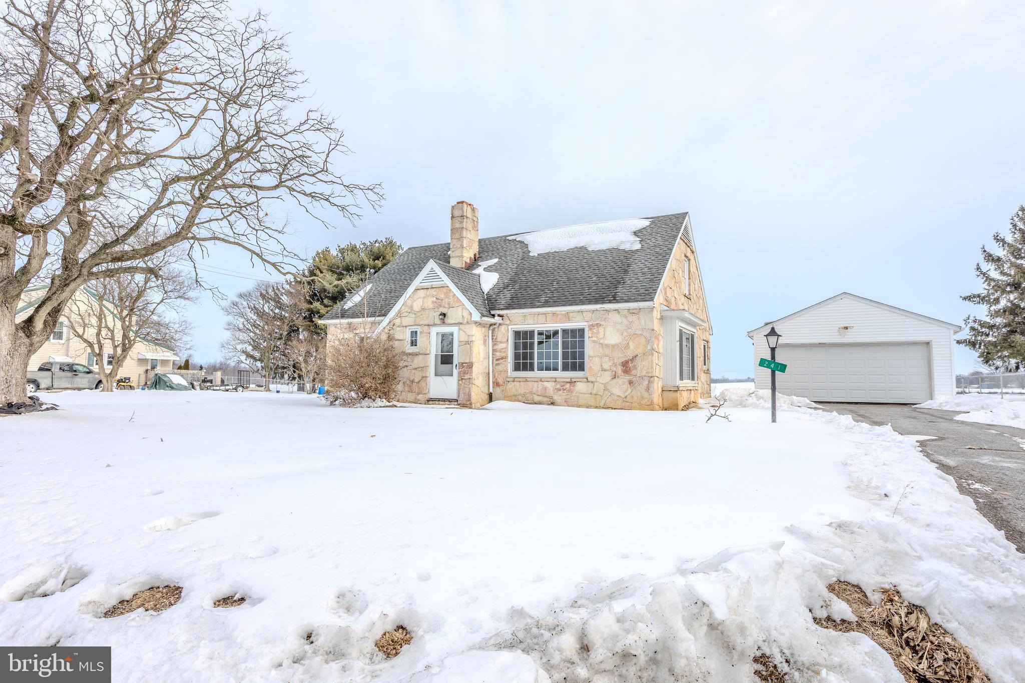 241 Wagner Road Chambersburg, PA 17202 - Photo 1 of 37 a front view of a house with snow on the road