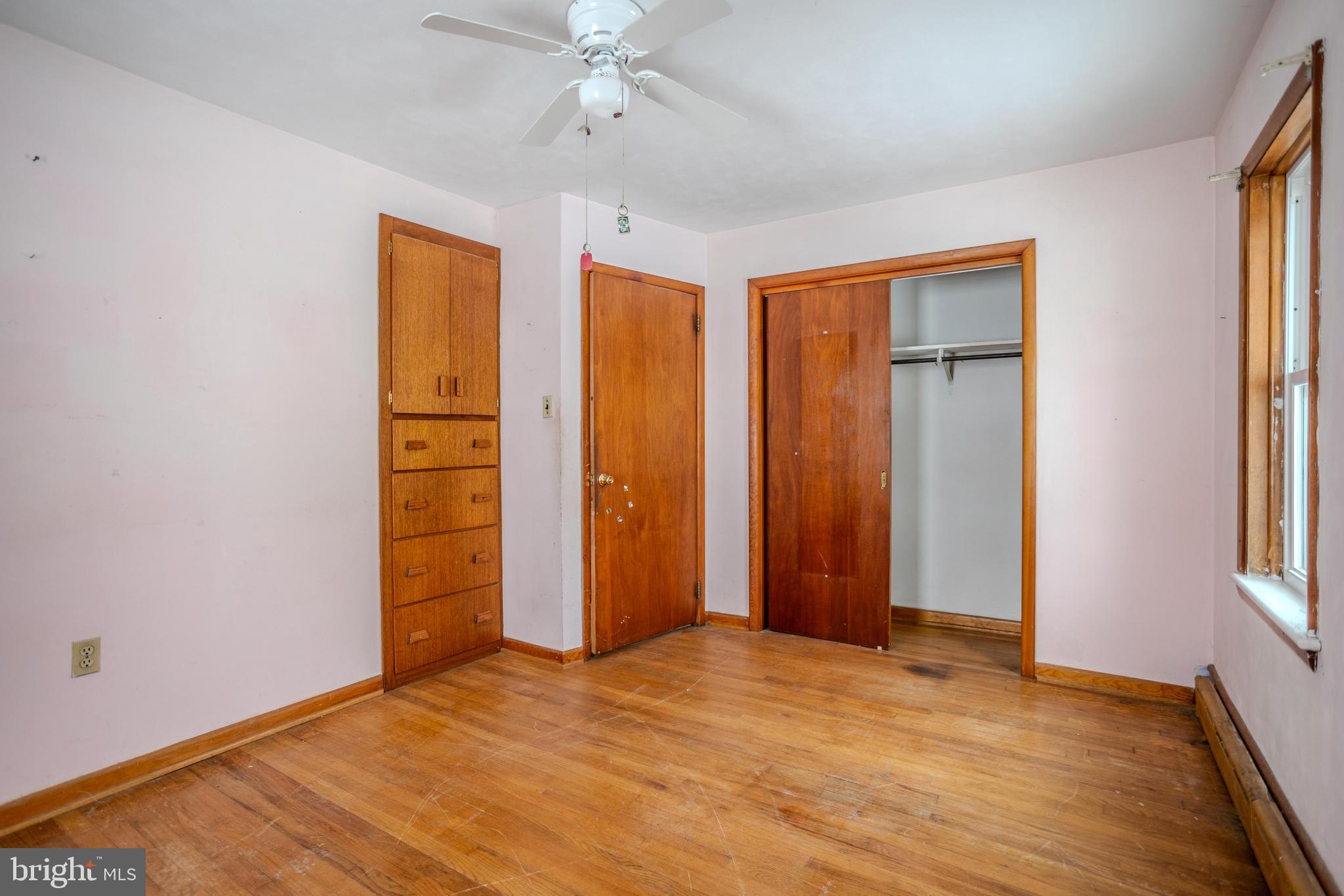 241 Wagner Road Chambersburg, PA 17202 - Photo 22 of 37 an empty room with windows and closet