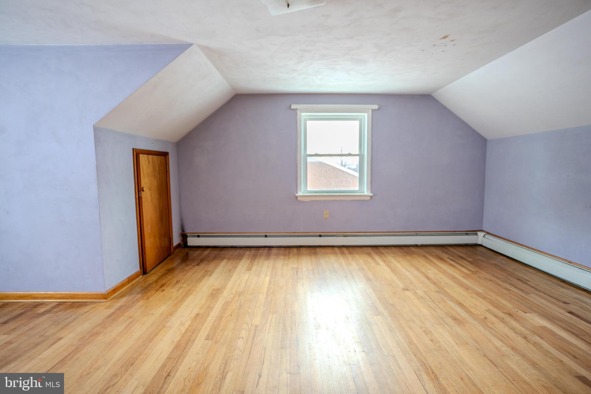 241 Wagner Road Chambersburg, PA 17202 - Photo 28 of 37 a view of a room with wooden floor and window