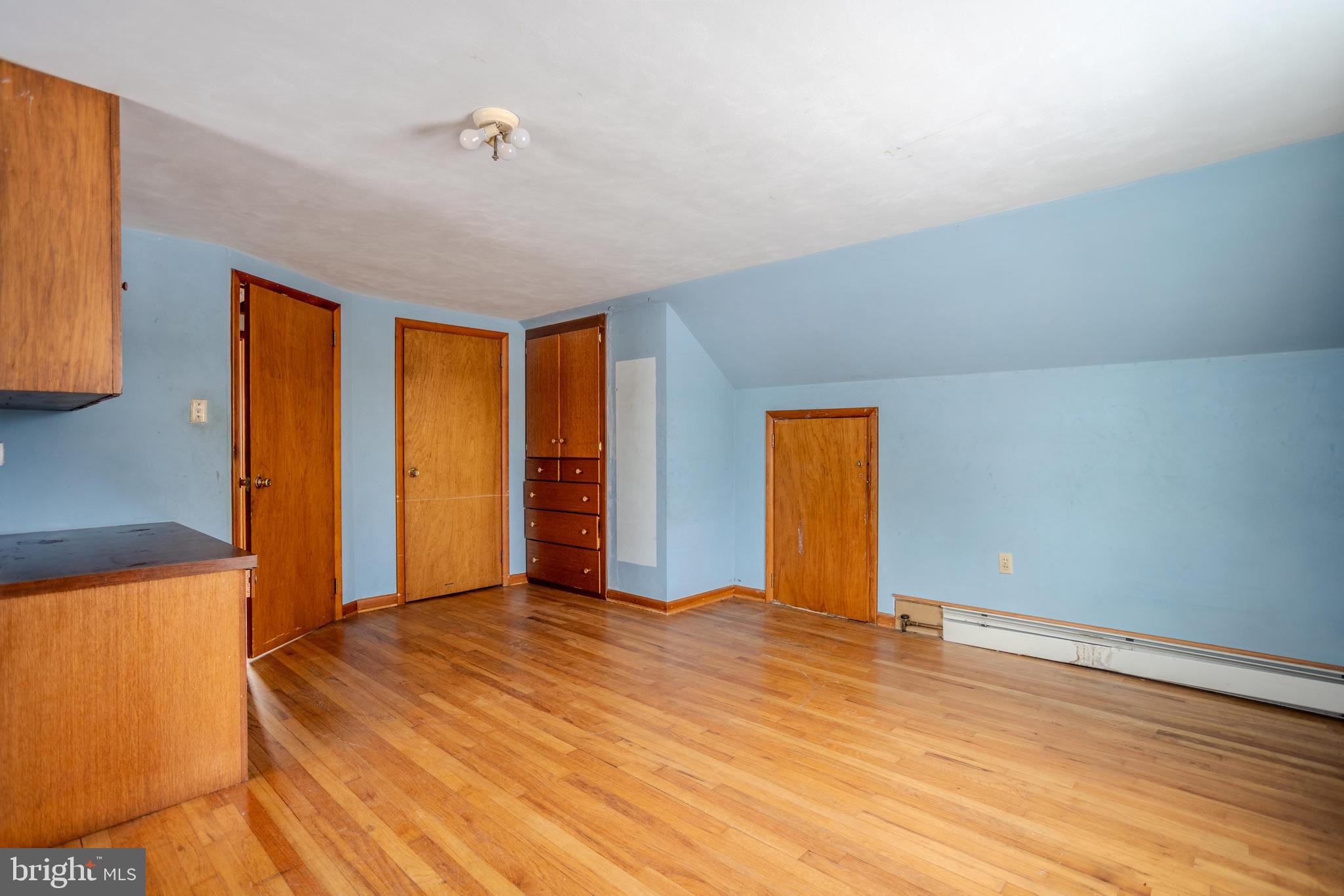 241 Wagner Road Chambersburg, PA 17202 - Photo 30 of 37 a view of empty room with wooden floor and fan