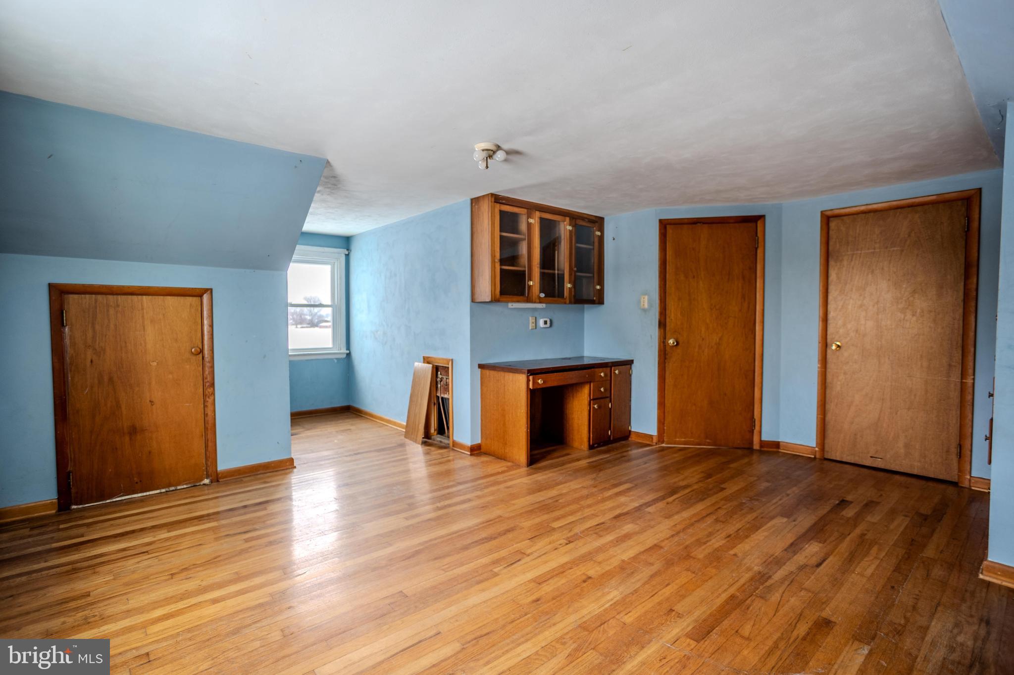 241 Wagner Road Chambersburg, PA 17202 - Photo 31 of 37 a view of empty room with wooden floor and fan