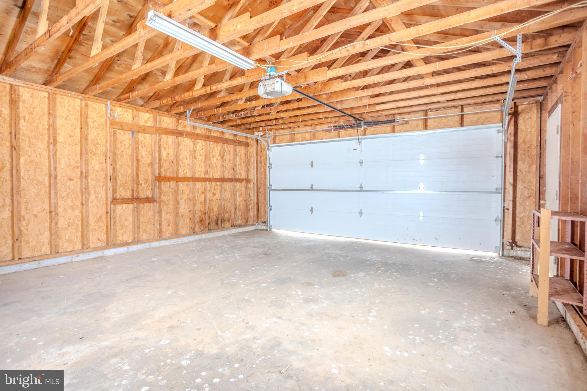 241 Wagner Road Chambersburg, PA 17202 - Photo 36 of 37 a view of a room with wooden walls and stairs