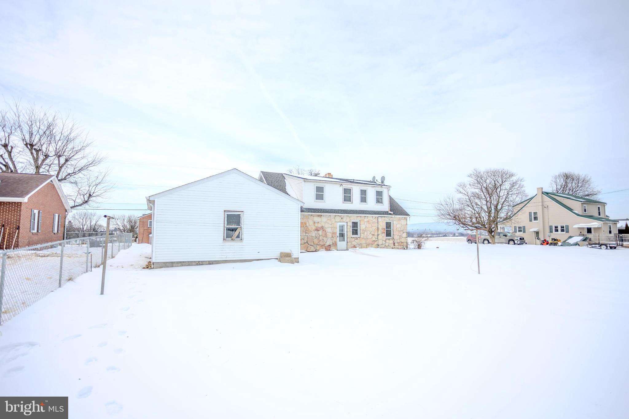 241 Wagner Road Chambersburg, PA 17202 - Photo 5 of 37 a house view with a outdoor space