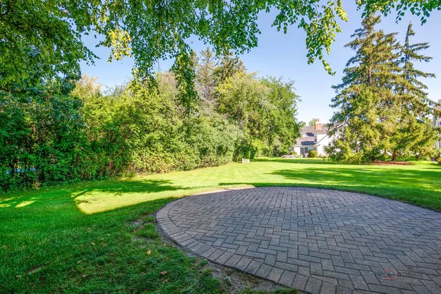 a view of a golf course with a lake
