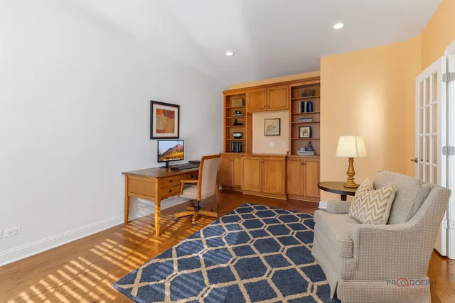 a bedroom with furniture and a window