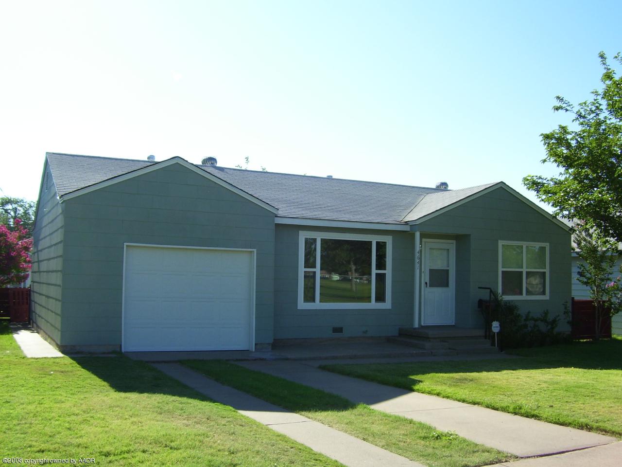 4641 Parker Street Amarillo, TX 79110 - Photo 1 of 8 a view of a house with a yard