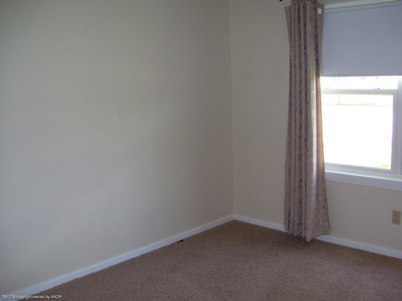 4641 Parker Street Amarillo, TX 79110 - Photo 8 of 8 a room that has a window