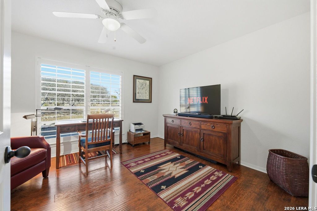 318 River Ridge Boerne, TX 78006 - Photo 25 of 46 a living room with furniture and a flat screen tv