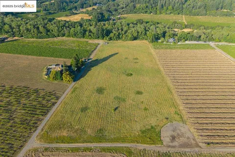 a view of a swimming pool with a lake