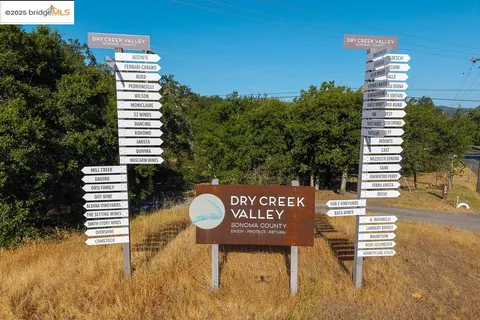 a sign that is on the side of a road