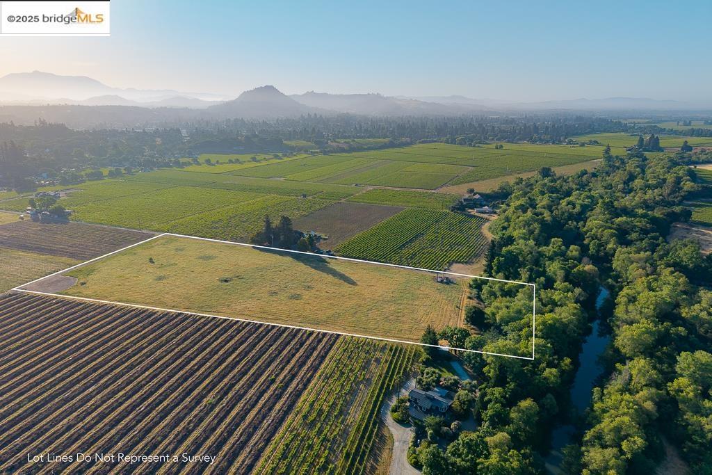 838 Dry Creek Road Healdsburg, CA 95448 - Photo 5 of 22 Overview of rural landscape with a mountain backdrop and property boundaries highlighted