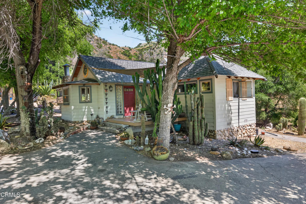 8416 Wheeler Canyon Road Santa Paula, CA 93060 - Photo 4 of 48 a view of a house with a yard