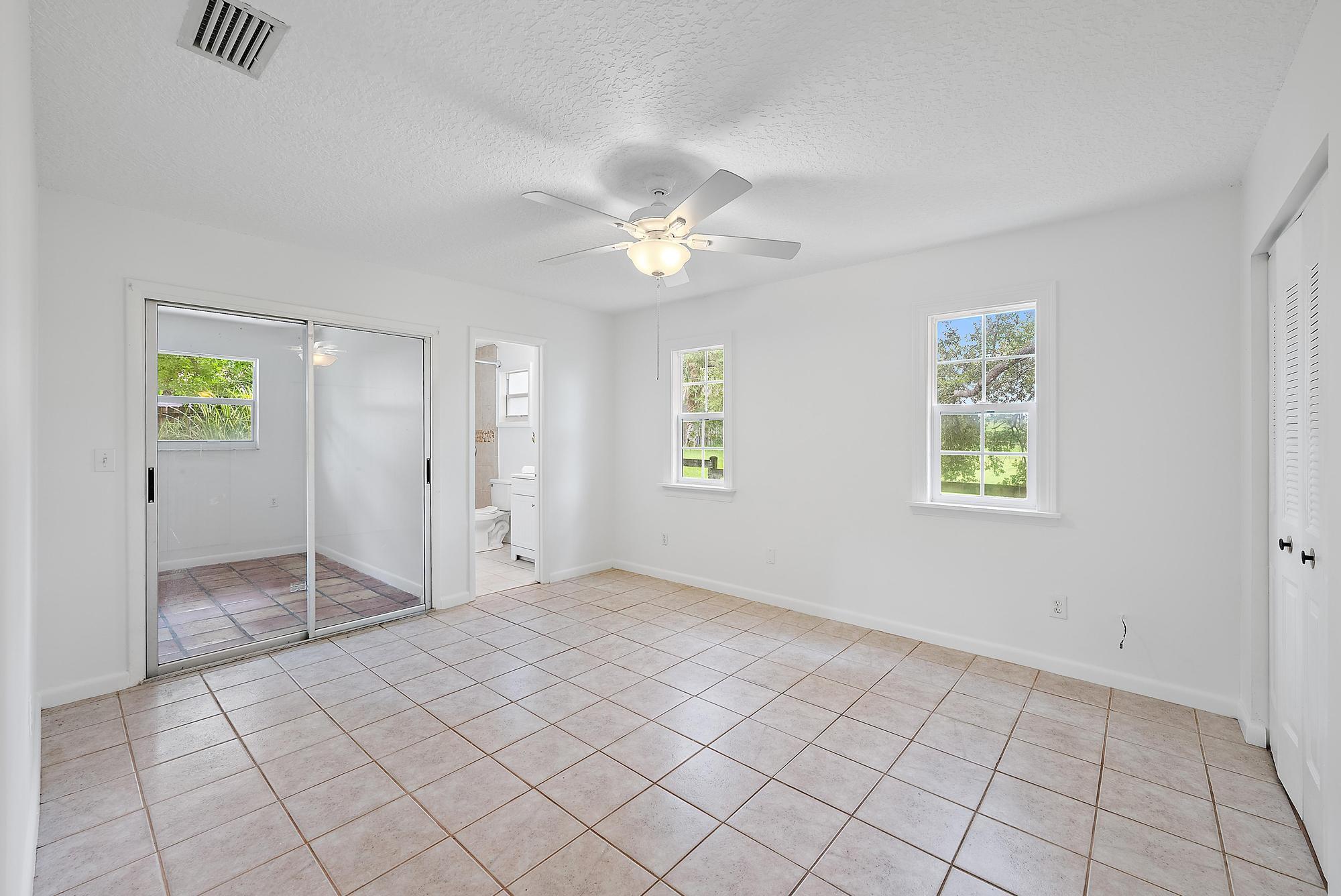 4628 Southeast Salvatori Road Stuart, FL 34997 - Photo 29 of 30 Primary Bedroom