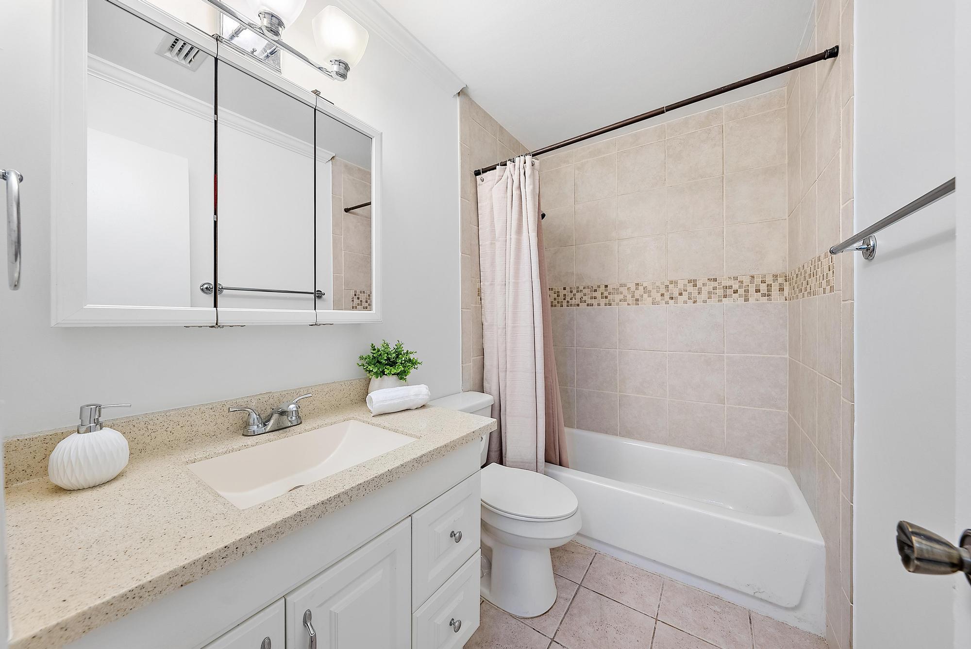 4628 Southeast Salvatori Road Stuart, FL 34997 - Photo 9 of 30 Guest Bathroom