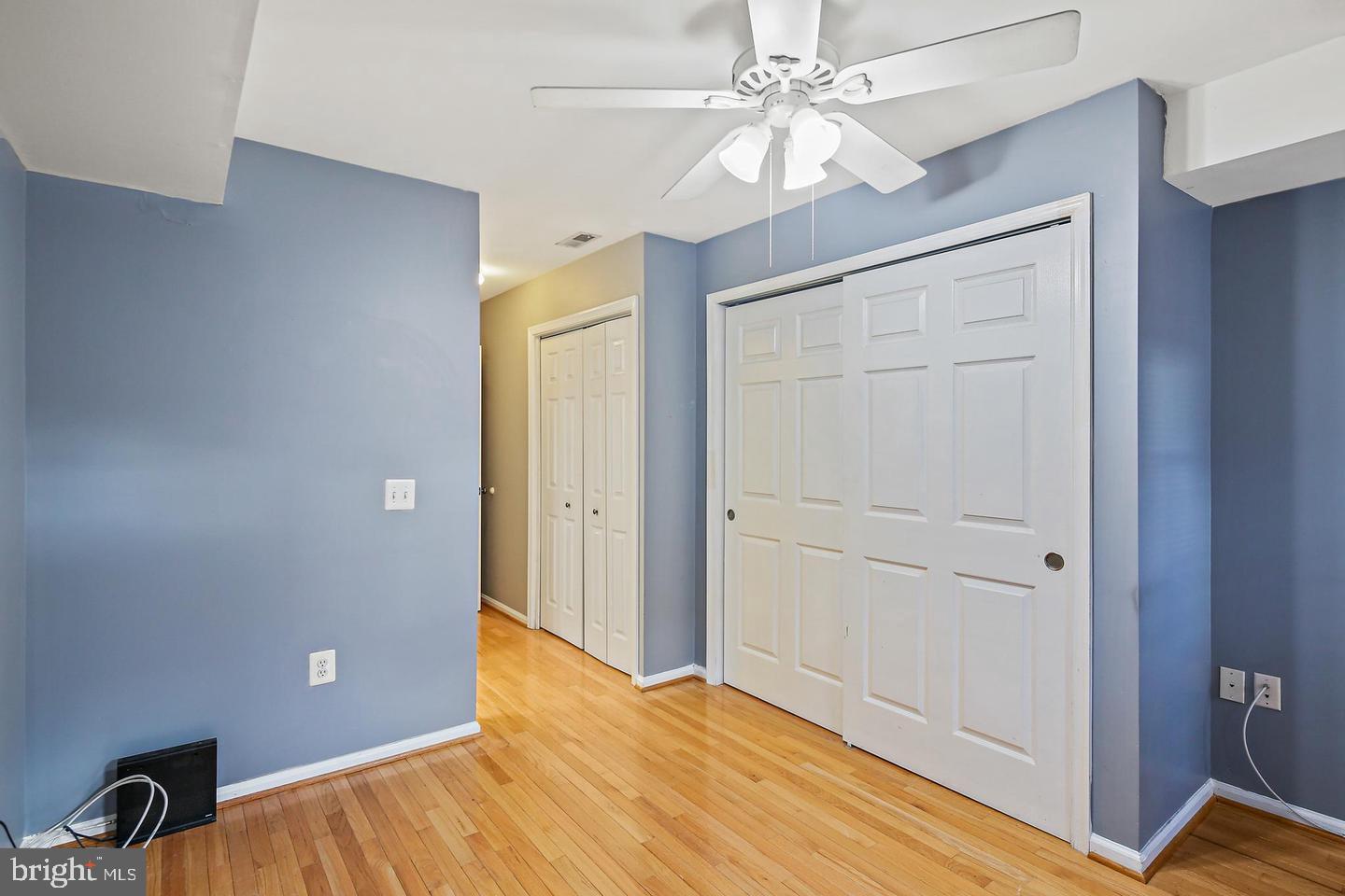 1723 Clarkson Street Baltimore, MD 21230 - Photo 16 of 27 a view of empty room with wooden floor