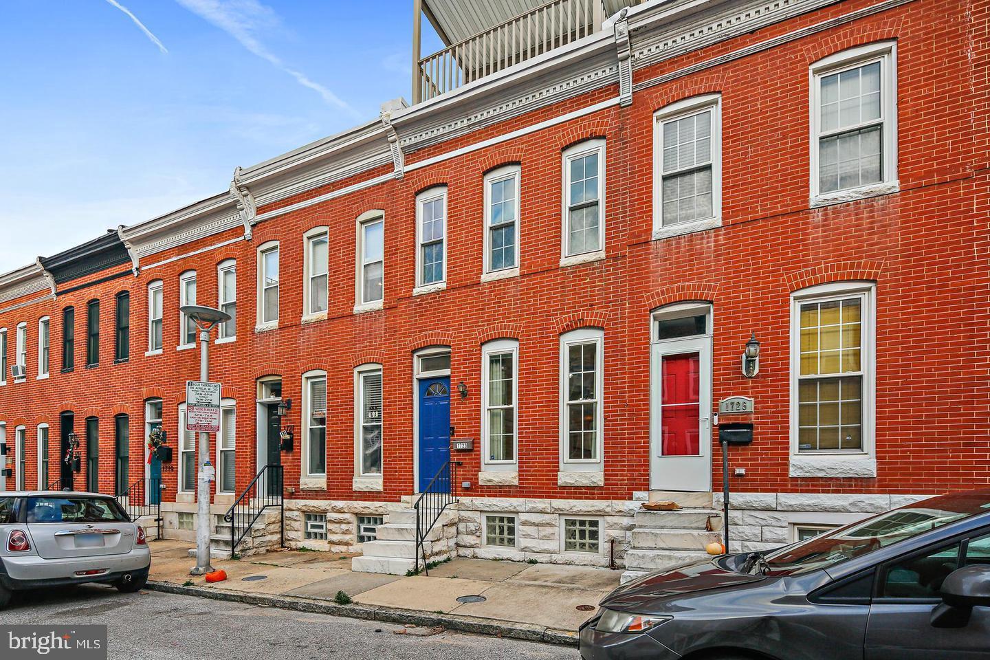 1723 Clarkson Street Baltimore, MD 21230 - Photo 2 of 27 a front view of a building with street view
