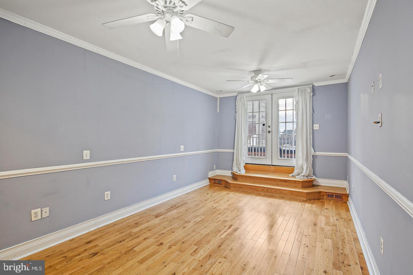 1723 Clarkson Street Baltimore, MD 21230 - Photo 21 of 27 a view of an empty room with a window