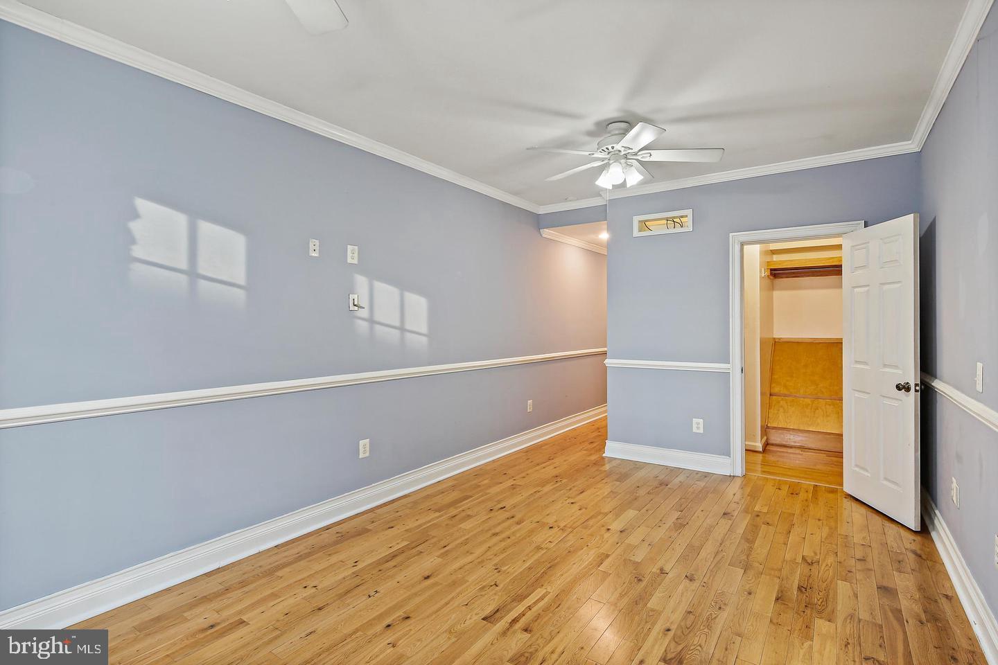 1723 Clarkson Street Baltimore, MD 21230 - Photo 22 of 27 a view of empty room with wooden floor