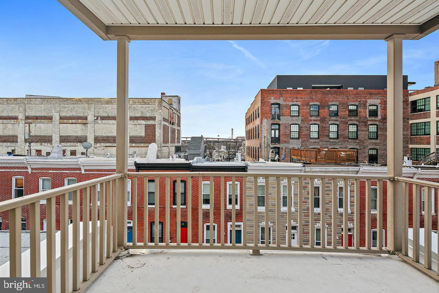 1723 Clarkson Street Baltimore, MD 21230 - Photo 25 of 27 a view of a building from a balcony