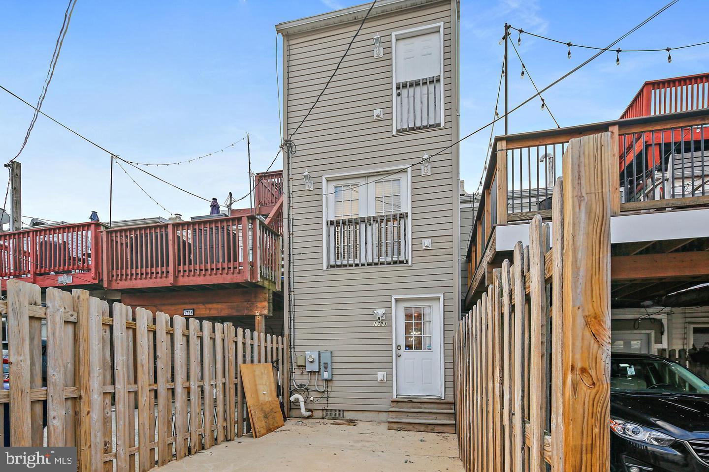 1723 Clarkson Street Baltimore, MD 21230 - Photo 27 of 27 a view of a house with wooden deck