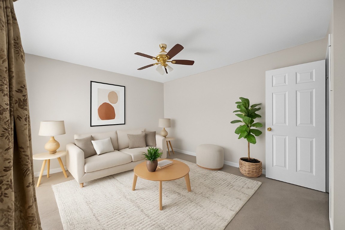 908 Vargas Road Austin, TX 78741 - Photo 6 of 33 a living room with furniture and a potted plant