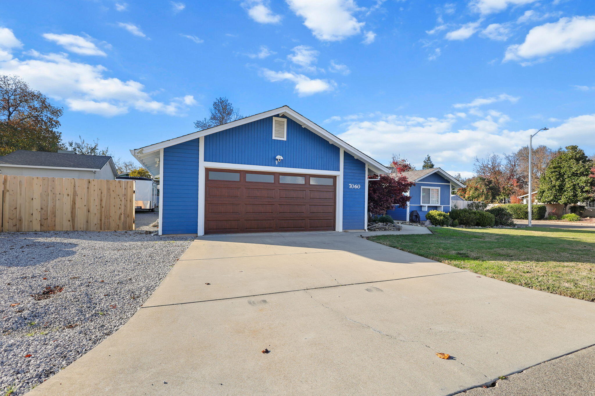7060 Pit Road Redding, CA 96001 - Photo 24 of 26 a front view of a house with a yard