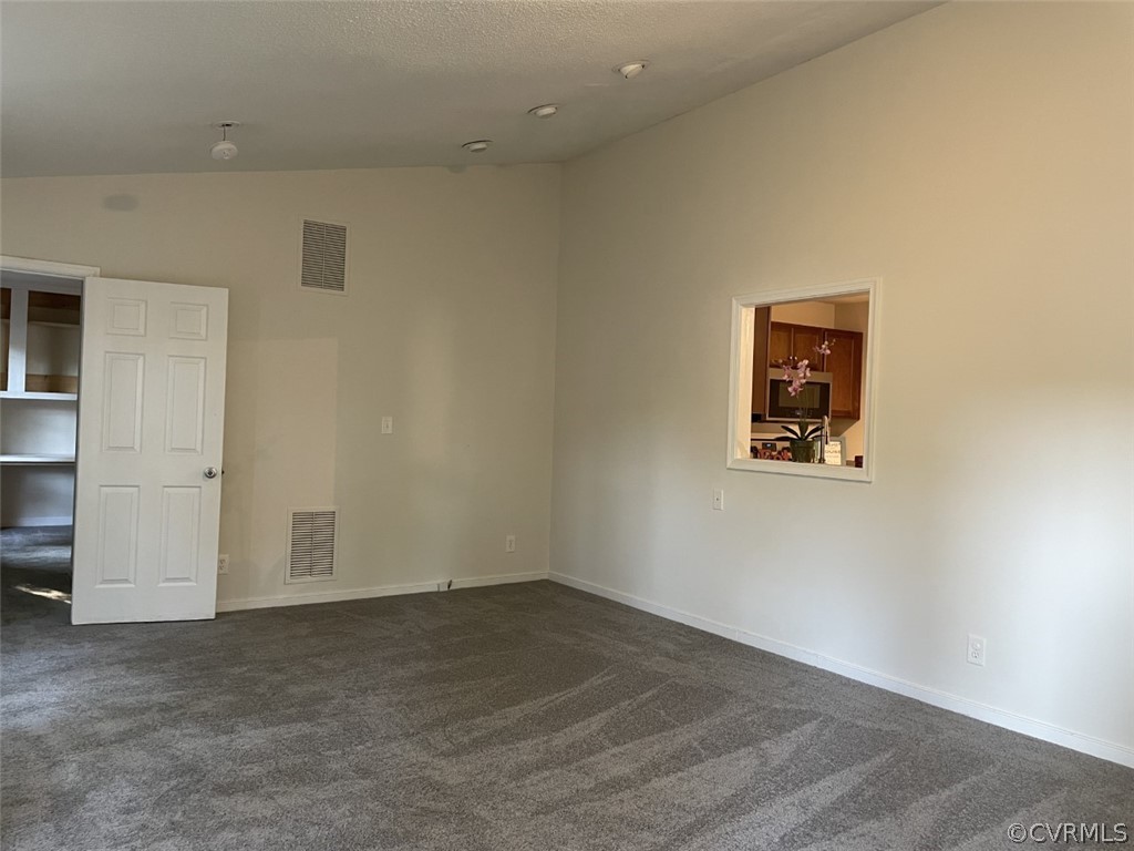 10648 Genlou Road Chesterfield, VA 23832 - Photo 3 of 16 an empty room with a workspace