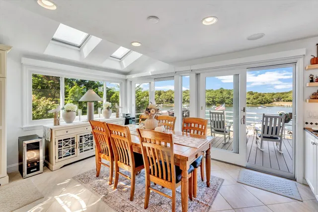 a bathroom with a sink toilet and mirror
