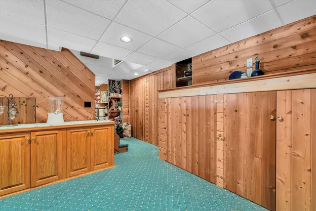 a view of a balcony with wooden floor and city view
