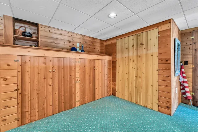 a view of a large body of water with a building in the background