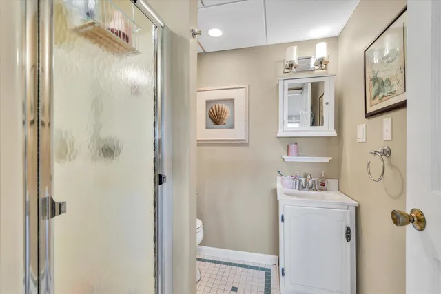 an aerial view of a house with a lake view