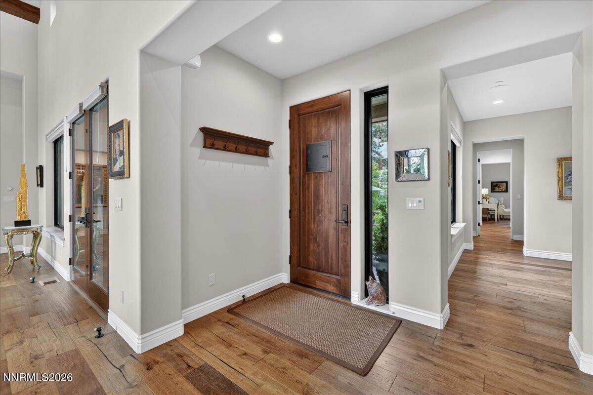 5096 Bordeaux Court Reno, NV 89511 - Photo 12 of 70 a view of a hallway with wooden floor and closet