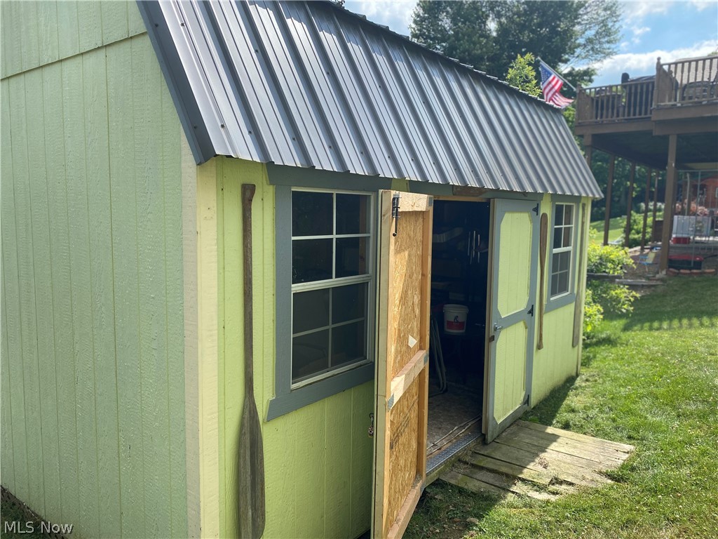 32183 Wisner Road Hanoverton, OH 44423 - Photo 15 of 18 View of shed / structure with a lawn