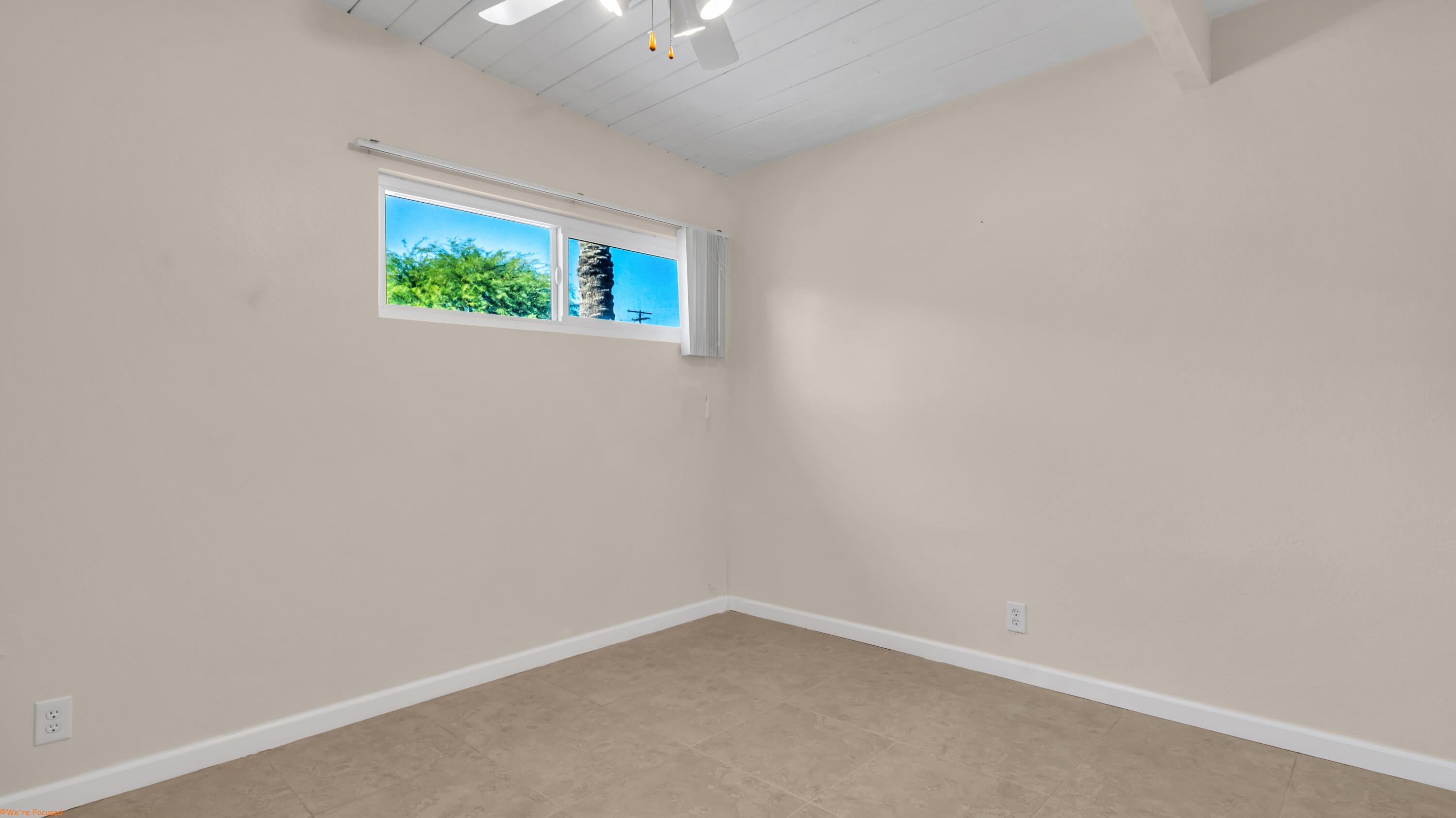 2272 North Starr Road Palm Springs, CA 92262 - Photo 14 of 38 an empty room with a window