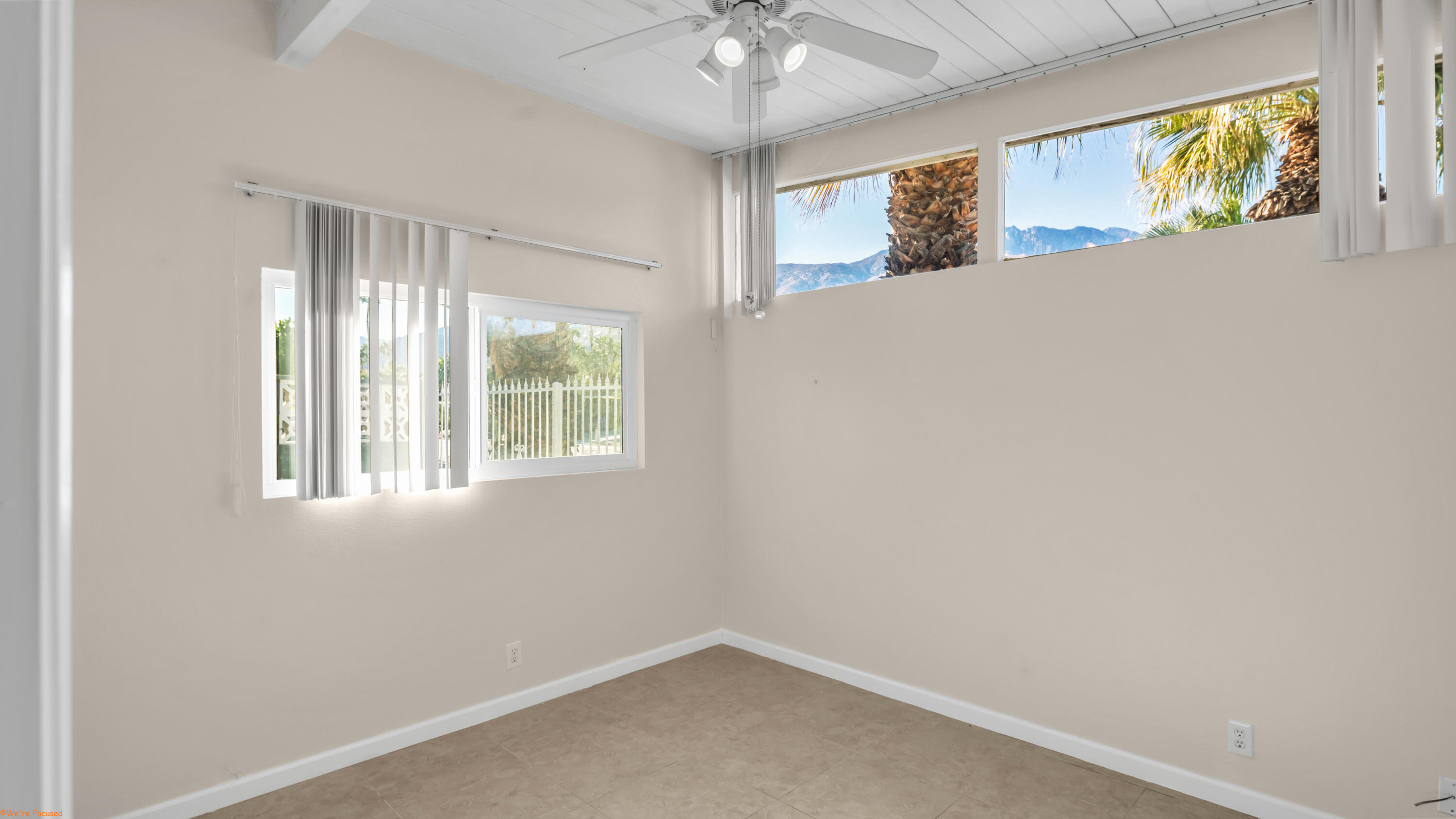 2272 North Starr Road Palm Springs, CA 92262 - Photo 19 of 38 a view of an empty room with a window
