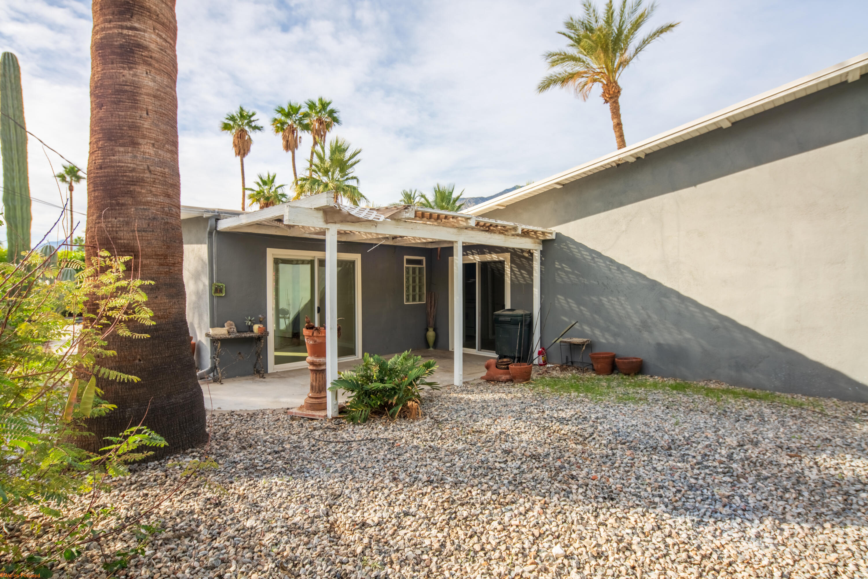 2272 North Starr Road Palm Springs, CA 92262 - Photo 37 of 38 a view of a house with porch and garden