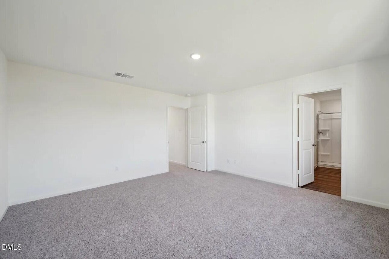 1336 Solace Way Rolesville, NC 27571 - Photo 24 of 28 a view of an empty room