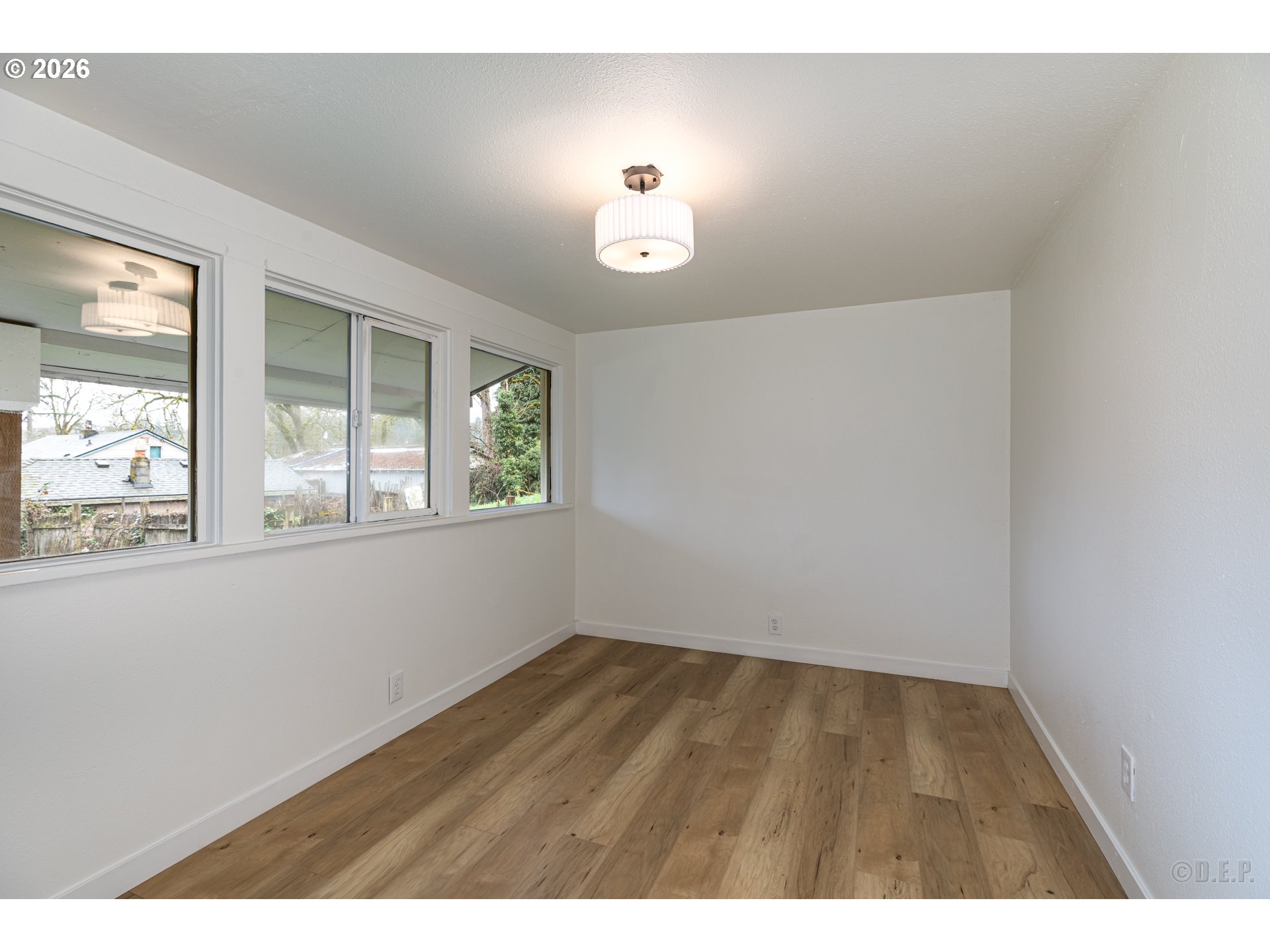 415 North 9th Street St. Helens, OR 97051 - Photo 12 of 21 a view of an empty room with a window