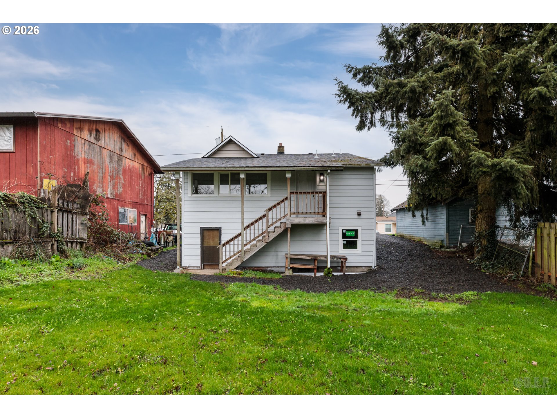 415 North 9th Street St. Helens, OR 97051 - Photo 17 of 21 a view of a house with a yard and sitting area