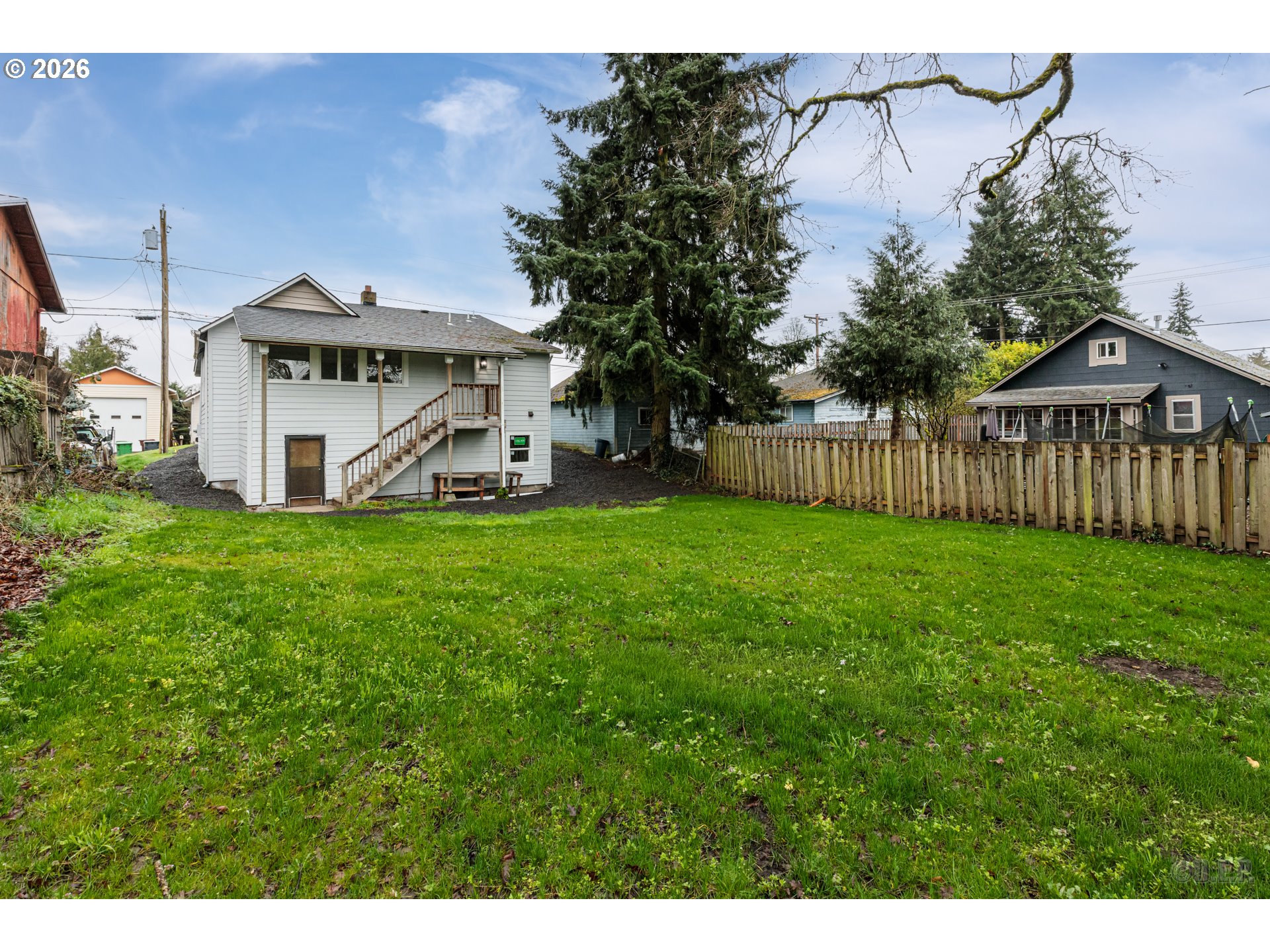 415 North 9th Street St. Helens, OR 97051 - Photo 18 of 21 a view of a house with a yard and sitting area
