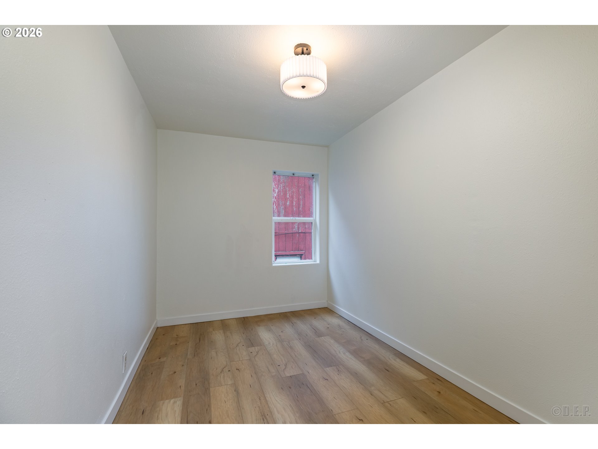 415 North 9th Street St. Helens, OR 97051 - Photo 9 of 21 a view of an empty room and window