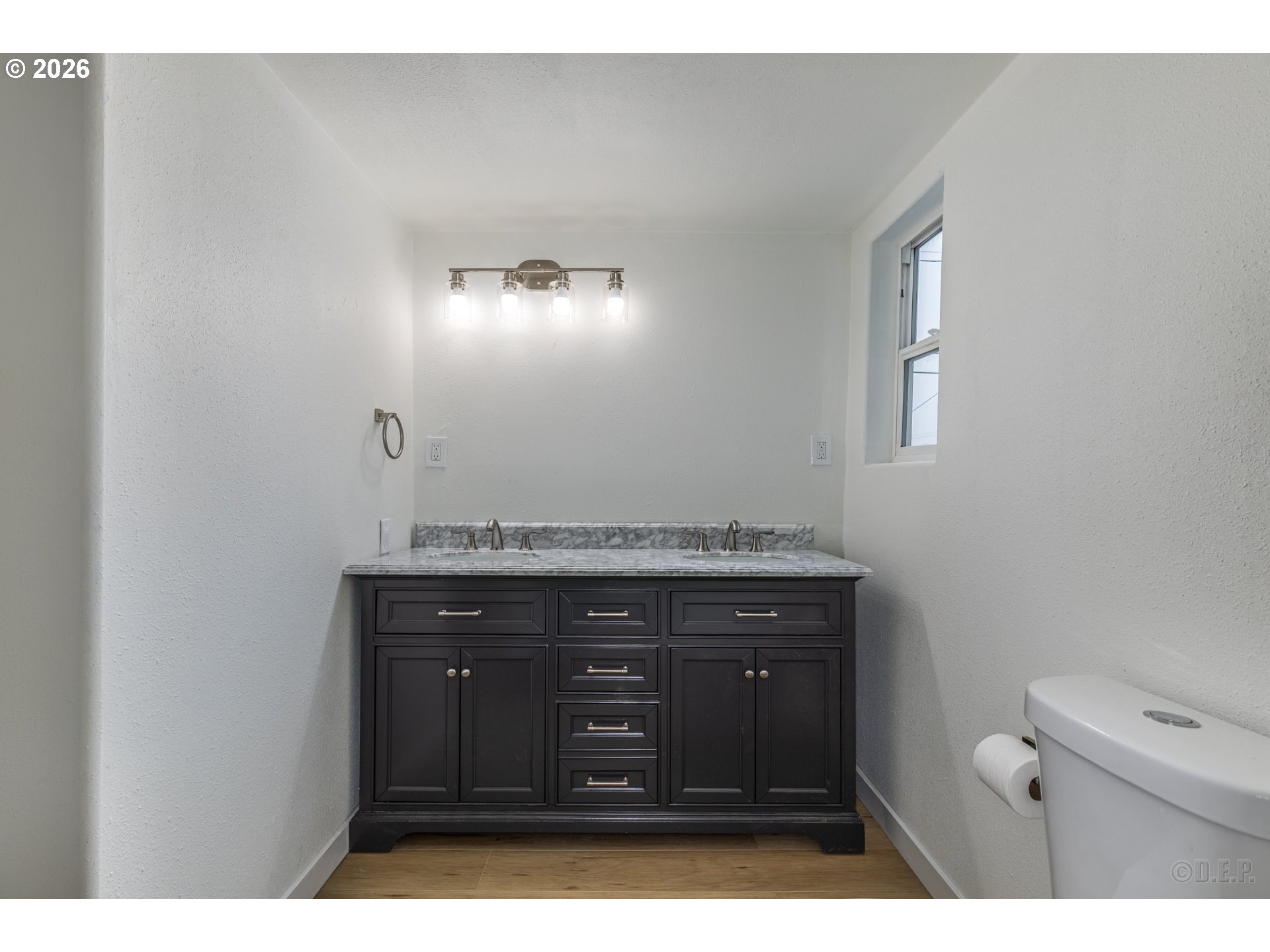 415 North 9th Street St. Helens, OR 97051 - Photo 10 of 21 a bathroom with a granite countertop sink and a mirror