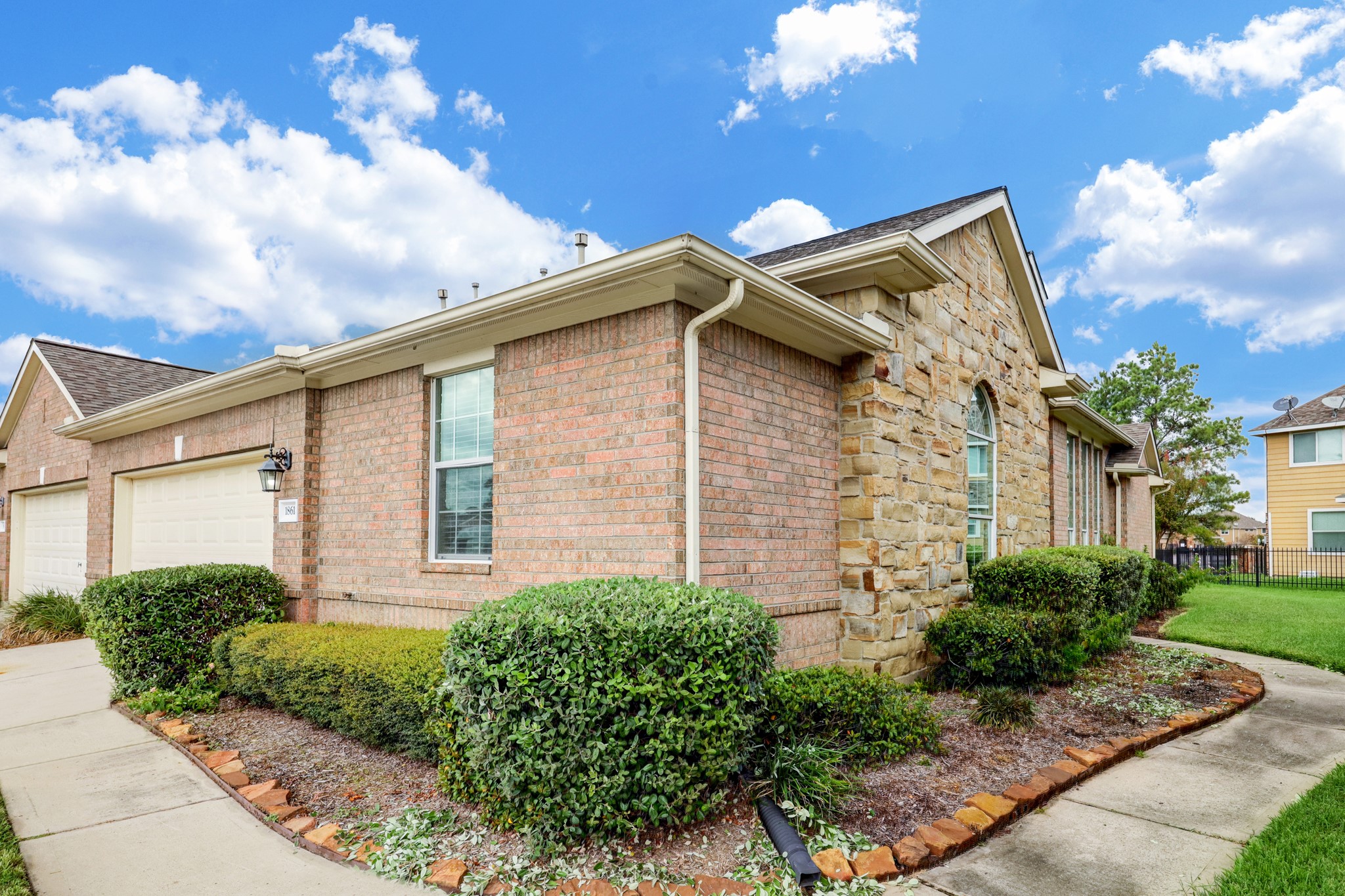 18618 Jaya Loch Court Spring, TX 77379 - Photo 2 of 18 a front view of a house with plants